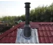 Installation of one element of chimney made of black metal